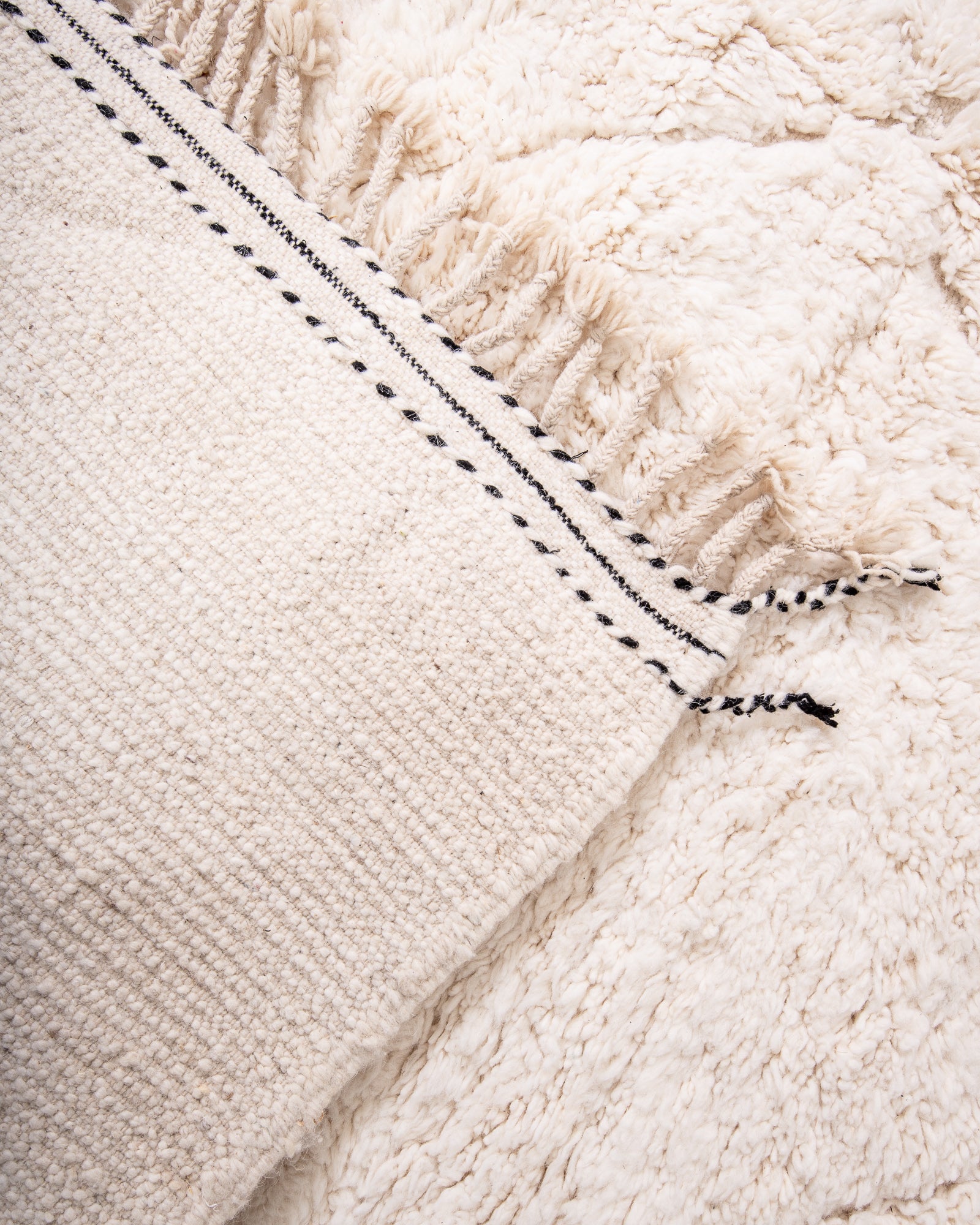 Modern, designer, handcrafted Berber rug from Morocco. Beniourain carpet with beautiful colours and patterns and fluffy wool texture.
